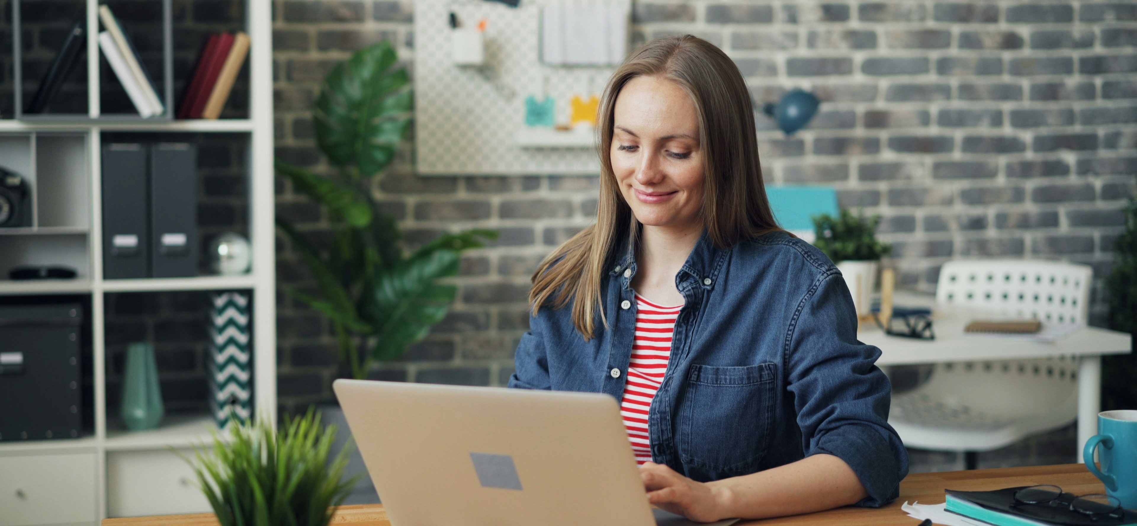 Person with laptop reduced